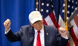 试图通过政变继续掌权的唐纳德·特朗普轻松赢得爱荷华州党团会议